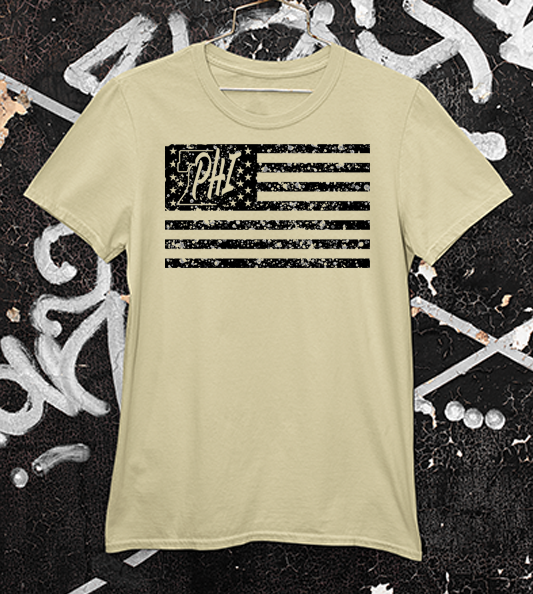 Black PHI distressed American flag design on a tan t shirt