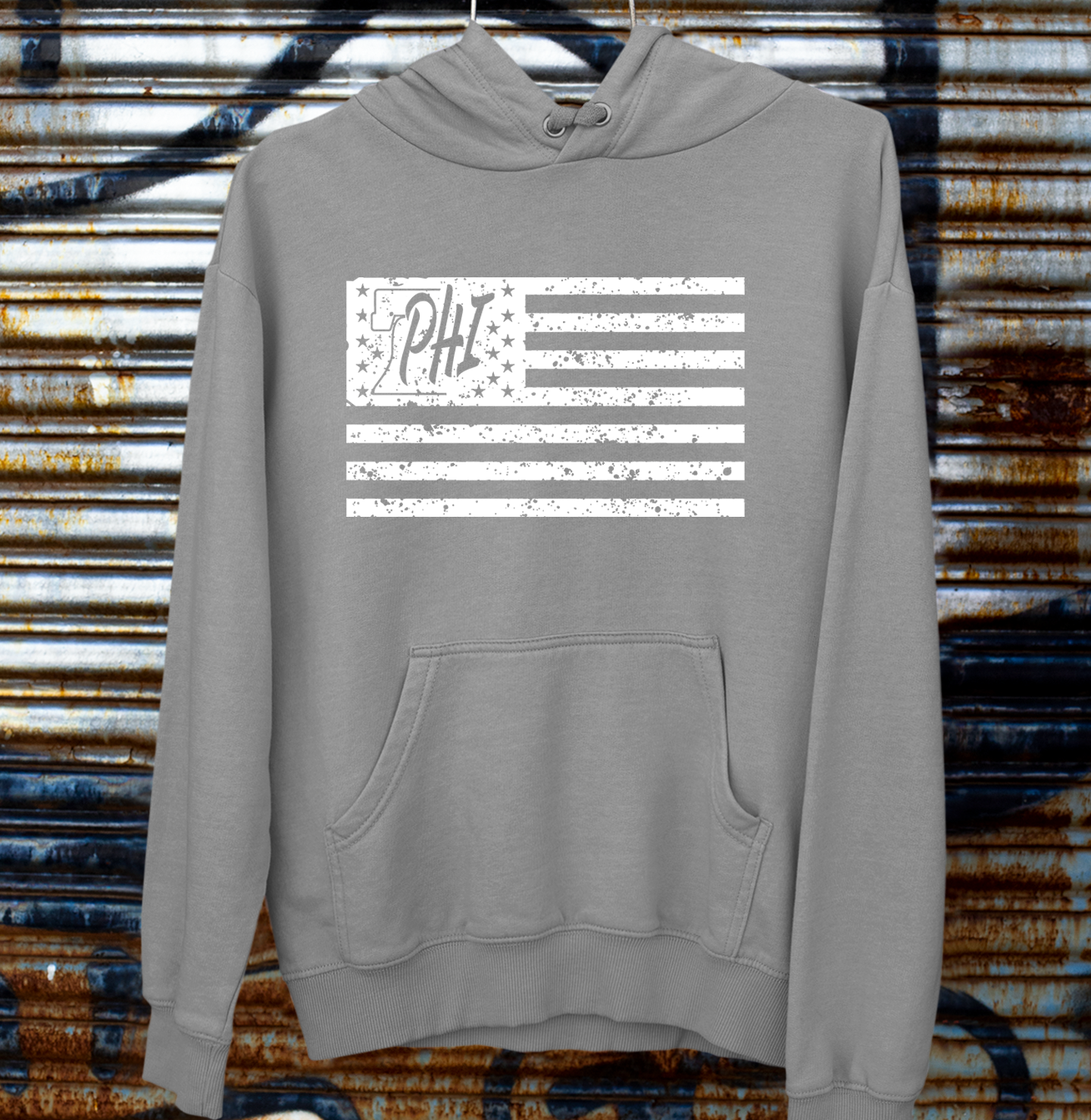 White PHI distressed American flag design on a grey t shirt